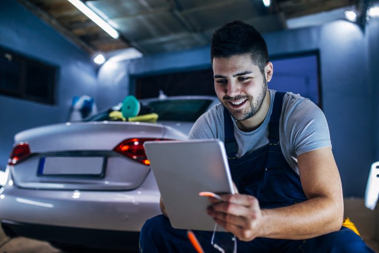 Young male car mechanic